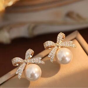Elegant Gold Bow Pearl Earrings